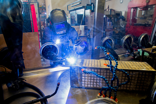 TIG Welding (Tungsten Inert Gas), also in a vacuum chamber